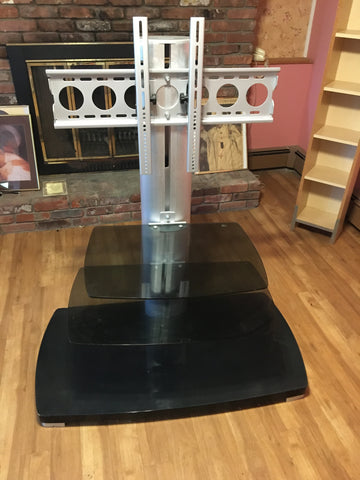 Two-Shelf Flat-Panel/Plasma TV Stand Sleek lines and innovative structure support large TVs with grace